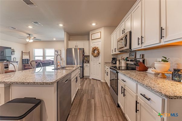 Interior, Kitchen, Recessed Lighting, Stainless Steel Appliances, Wood Texture Flooring