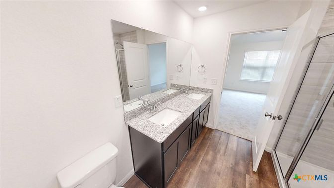 Bathroom, Dual Sink Vanities, Interior, Recessed Lighting, Wood Texture Flooring