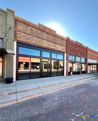 Exterior, Facade, Brick Facade, Condo Building