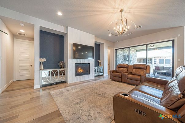 Fireplace, Interior, Living room, Pendant Lights, Recessed Lighting, Wood Texture Flooring