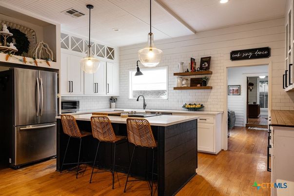 Interior, Kitchen, Pendant Lights, Recessed Lighting, Stainless Steel Appliances, Stone Walls, Wood Texture Flooring