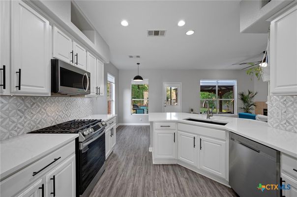 Interior, Kitchen, Pendant Lights, Recessed Lighting, Stainless Steel Appliances, Wood Texture Flooring