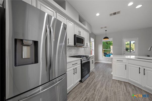 Interior, Kitchen, Pendant Lights, Recessed Lighting, Stainless Steel Appliances, Wood Texture Flooring