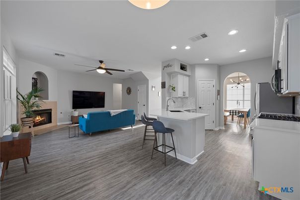 Fireplace, Interior, Kitchen, Living room, Recessed Lighting, Wood Texture Flooring