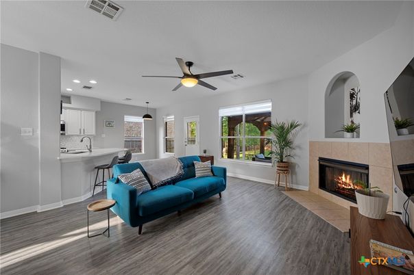 Fireplace, Interior, Kitchen, Living room, Recessed Lighting, Wood Texture Flooring