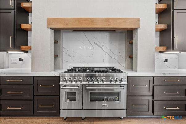 Interior, Kitchen, Marble Walls, Stainless Steel Appliances, Wood Texture Flooring
