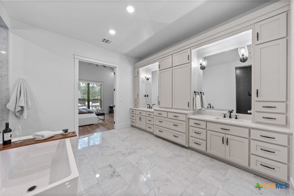Bathroom, Dual Sink Vanities, Interior, Marble, Recessed Lighting, Wood Texture Flooring