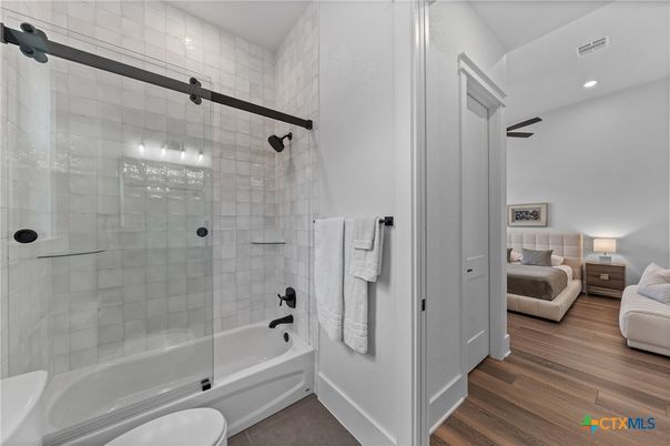 Bathroom, Bedroom, Glass Shower, Interior, Recessed Lighting, Wood Texture Flooring