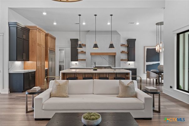 Interior, Kitchen, Living room, Marble Walls, Pendant Lights, Recessed Lighting, Stainless Steel Appliances, Wood Texture Flooring