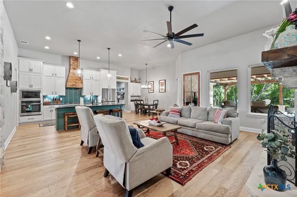 Dining room, Interior, Kitchen, Living room, Pendant Lights, Recessed Lighting, Stainless Steel Appliances, Wood Texture Flooring