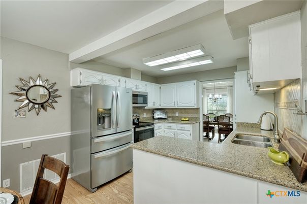 Chandelier, Interior, Kitchen, Stainless Steel Appliances, Wood Texture Flooring