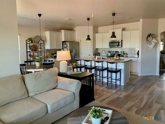 Dining room, Interior, Kitchen, Living room, Pendant Lights, Recessed Lighting, Stainless Steel Appliances, Wood Texture Flooring