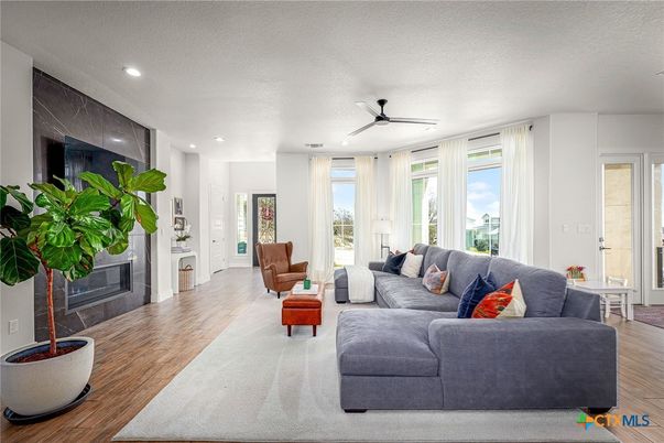 Fireplace, Interior, Living room, Recessed Lighting, Wood Texture Flooring