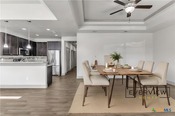 Dining room, Interior, Kitchen, Pendant Lights, Recessed Lighting, Stainless Steel Appliances, Wood Texture Flooring