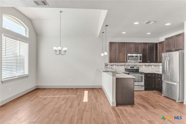 Chandelier, Interior, Kitchen, Pendant Lights, Recessed Lighting, Stainless Steel Appliances, Wood Texture Flooring