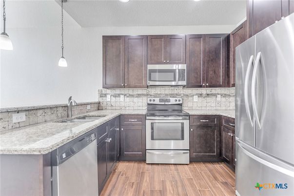 Interior, Kitchen, Pendant Lights, Stainless Steel Appliances, Wood Texture Flooring