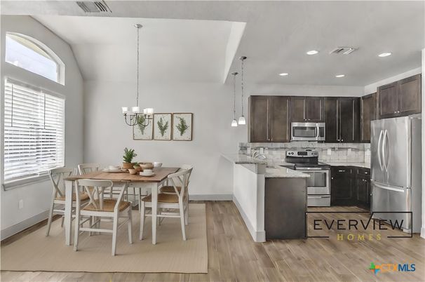 Dining room, Interior, Kitchen, Pendant Lights, Recessed Lighting, Stainless Steel Appliances, Wood Texture Flooring