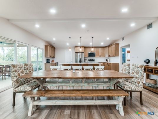 Dining room, Interior, Kitchen, Pendant Lights, Recessed Lighting, Stainless Steel Appliances, Wood Texture Flooring