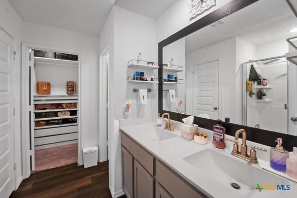 Bathroom, Dual Sink Vanities, Interior, Recessed Lighting, Wood Texture Flooring