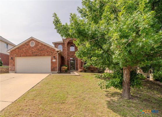 Attached, Backyard, Exterior, Facade, Brick Facade, Brick Traditional