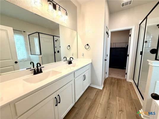 Bathroom, Dual Sink Vanities, Glass Shower, Interior, Wood Texture Flooring