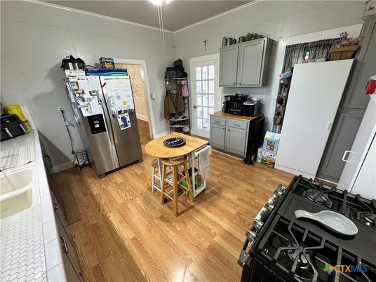 Interior, Kitchen, Tile Countertops, Wood Texture Flooring