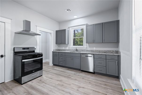 Interior, Kitchen, Recessed Lighting, Stainless Steel Appliances, Wood Texture Flooring
