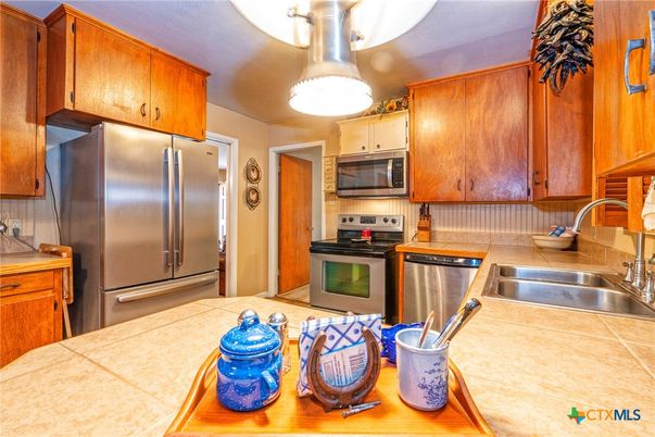 Interior, Kitchen, Stainless Steel Appliances, Tile Countertops