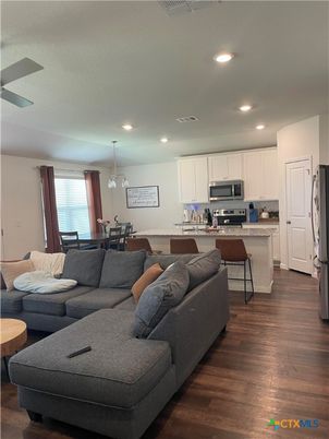 Dining room, Interior, Kitchen, Living room, Pendant Lights, Recessed Lighting, Stainless Steel Appliances, Wood Texture Flooring