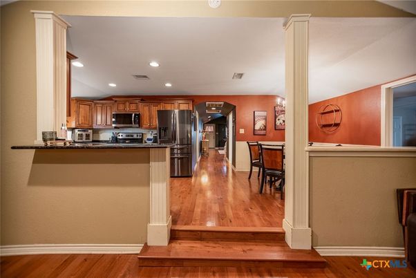 Dining room, Interior, Kitchen, Recessed Lighting, Stainless Steel Appliances, Wood Texture Flooring