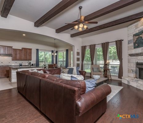 Dining room, Fireplace, Interior, Kitchen, Living room, Pendant Lights, Recessed Lighting, Stone Walls, Wooden Beams, Wood Texture Flooring