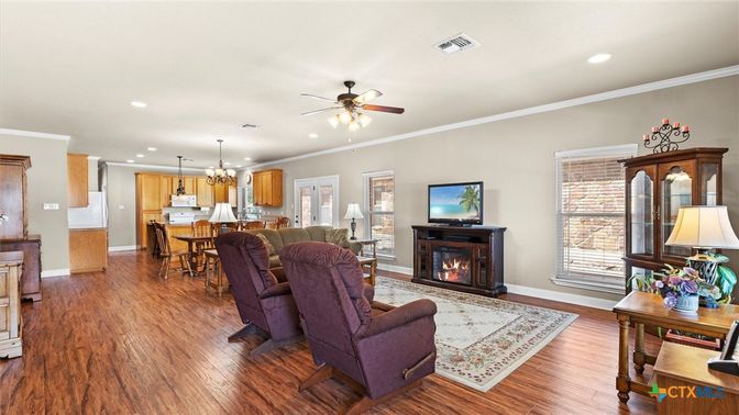 Chandelier, Dining room, Fireplace, Interior, Kitchen, Living room, Pendant Lights, Recessed Lighting, Wood Texture Flooring