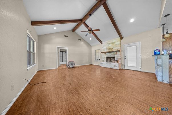 Empty room, Fireplace, Interior, Recessed Lighting, Wooden Beams, Wood Texture Flooring