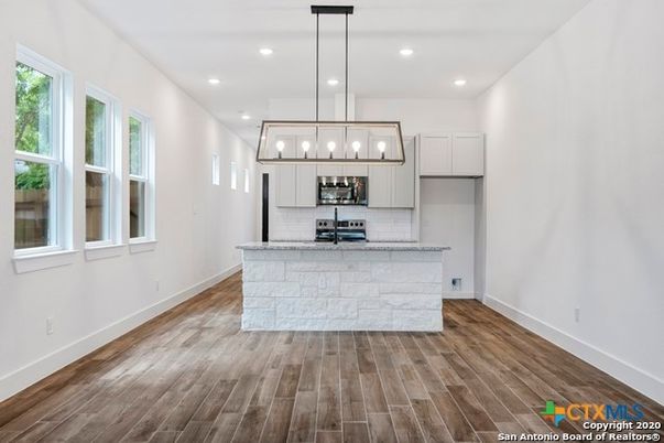Interior, Kitchen, Pendant Lights, Recessed Lighting, Stainless Steel Appliances, Wood Texture Flooring