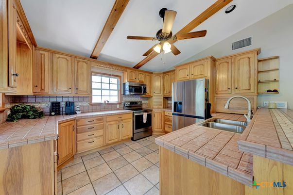 Interior, Kitchen, Stainless Steel Appliances, Tile Countertops, Wooden Beams