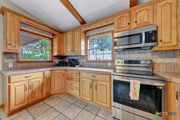 Interior, Kitchen, Stainless Steel Appliances, Tile Countertops, Wooden Beams