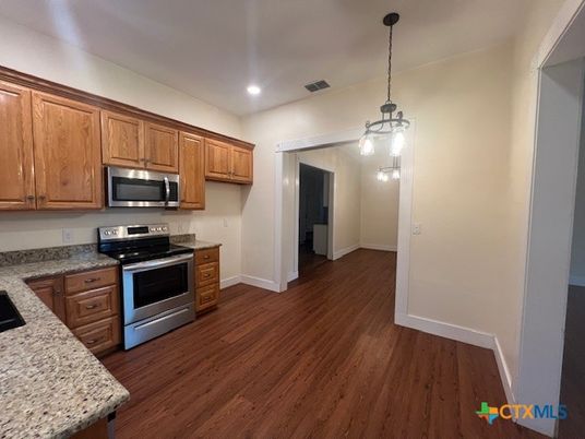 Interior, Kitchen, Pendant Lights, Recessed Lighting, Stainless Steel Appliances, Wood Texture Flooring