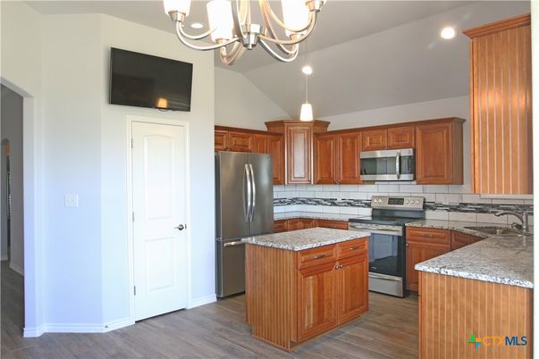 Chandelier, Interior, Kitchen, Pendant Lights, Recessed Lighting, Stainless Steel Appliances, Wood Texture Flooring