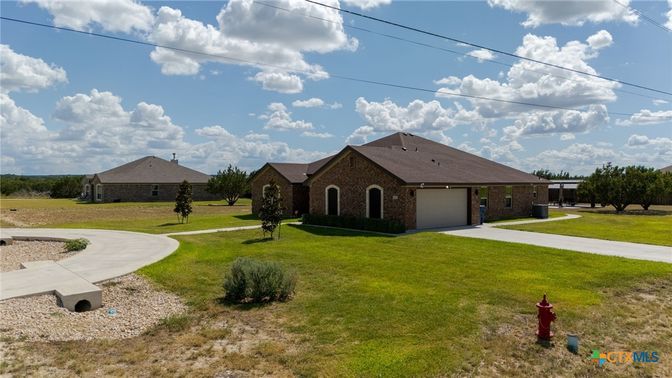 Attached, Backyard, Exterior, Facade, Brick Facade, Ranch