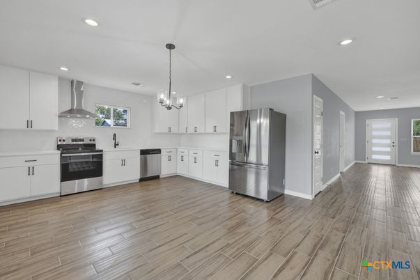 Interior, Kitchen, Pendant Lights, Recessed Lighting, Stainless Steel Appliances, Wood Texture Flooring