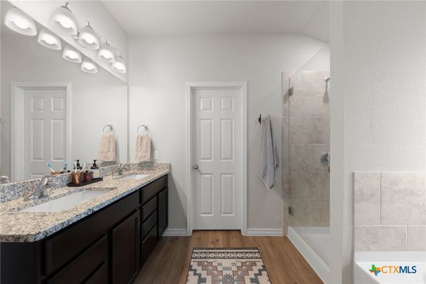 Bathroom, Dual Sink Vanities, Glass Shower, Interior, Wood Texture Flooring