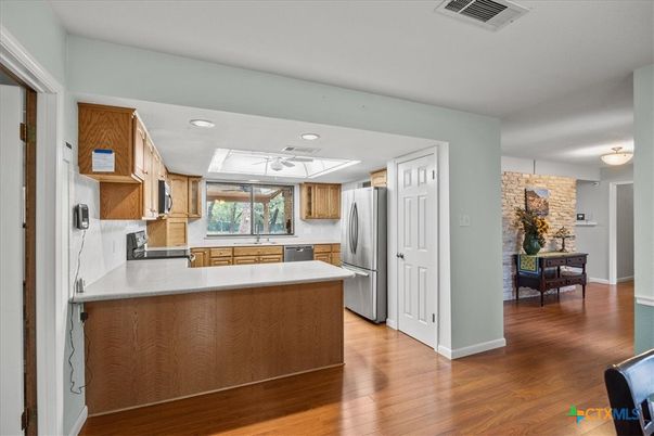 Interior, Kitchen, Recessed Lighting, Stone Walls, Wood Texture Flooring