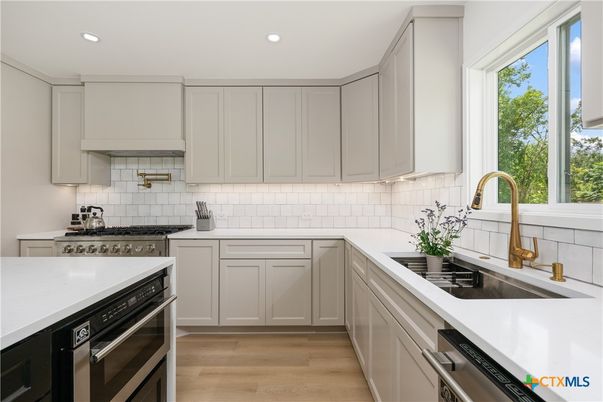 Interior, Kitchen, Recessed Lighting, Stainless Steel Appliances, Wood Texture Flooring