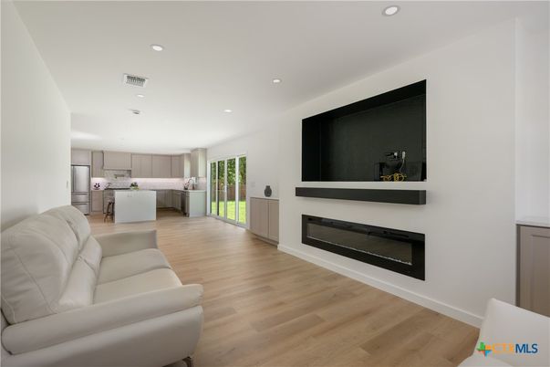 Fireplace, Interior, Kitchen, Recessed Lighting, Wood Texture Flooring