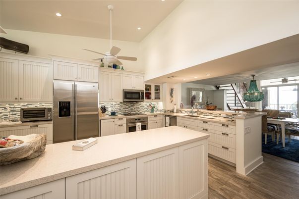Dining room, Interior, Kitchen, Recessed Lighting, Stainless Steel Appliances, Wood Texture Flooring