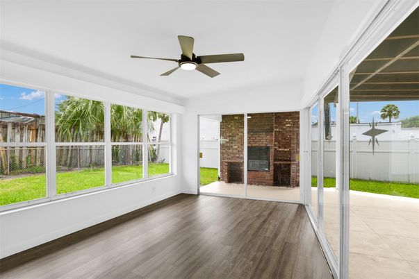 Empty room, Fireplace, Interior, Stone Walls, Sun Room, Wood Texture Flooring