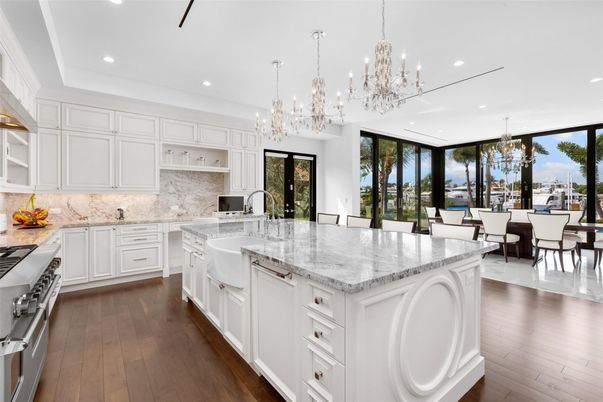 Chandelier, Dining room, Interior, Kitchen, Pendant Lights, Recessed Lighting, Stainless Steel Appliances, Wood Texture Flooring
