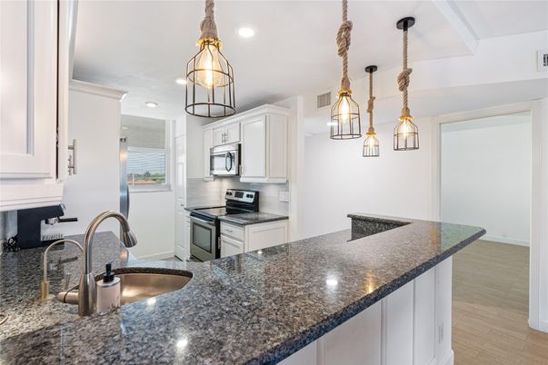 Interior, Kitchen, Pendant Lights, Recessed Lighting, Stainless Steel Appliances, Wood Texture Flooring