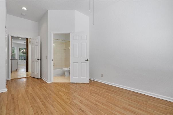 Bathroom, Empty room, Glass Shower, Interior, Recessed Lighting, Wood Texture Flooring