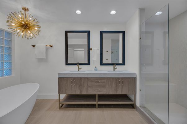 Bathroom, Dual Sink Vanities, Free Standing Baths, Glass Shower, Interior, Pendant Lights, Recessed Lighting, Wood Texture Flooring